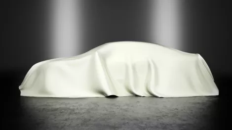 What integrated video solution does this luxury sports car dealership use?